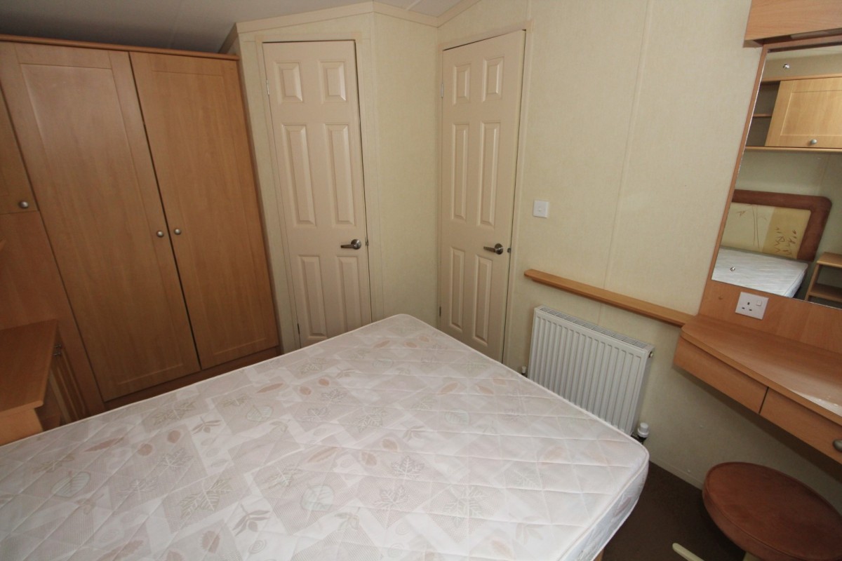 double bedroom with central heating