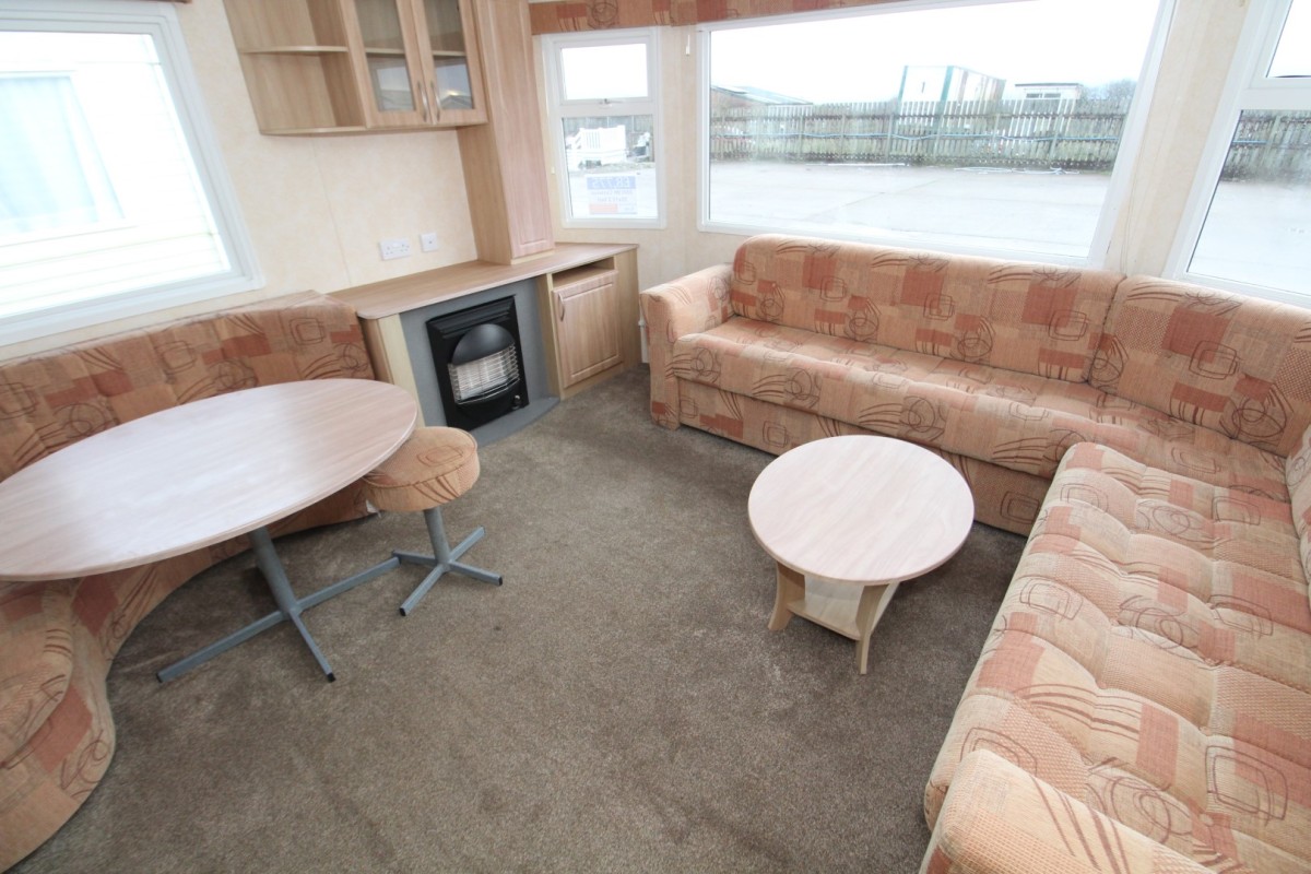 L shaped sofas in the caravan lounge area