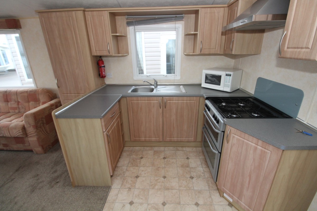 kitchen with oven and sink in the caravan