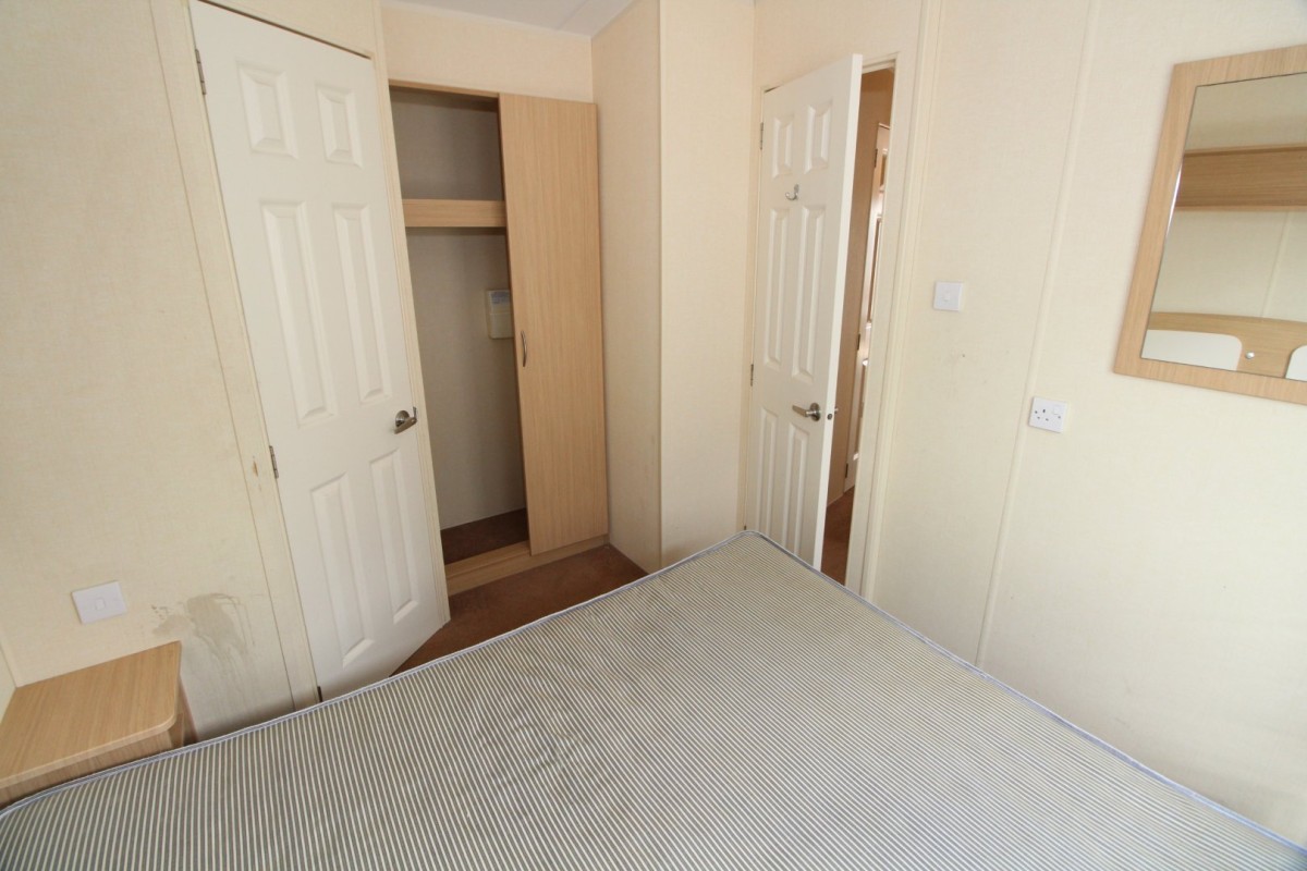 double bedroom with wardrobes