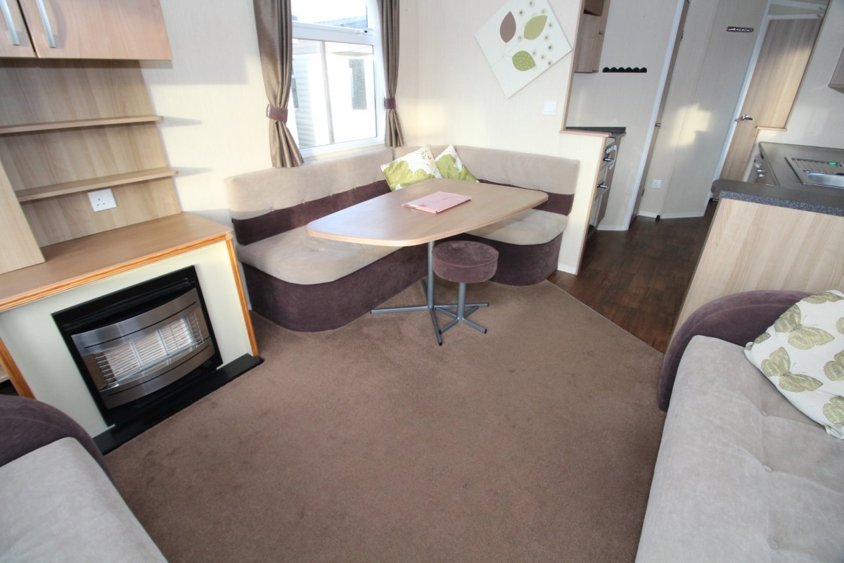 lounge with dining table in the 2013 Swift Burgundy