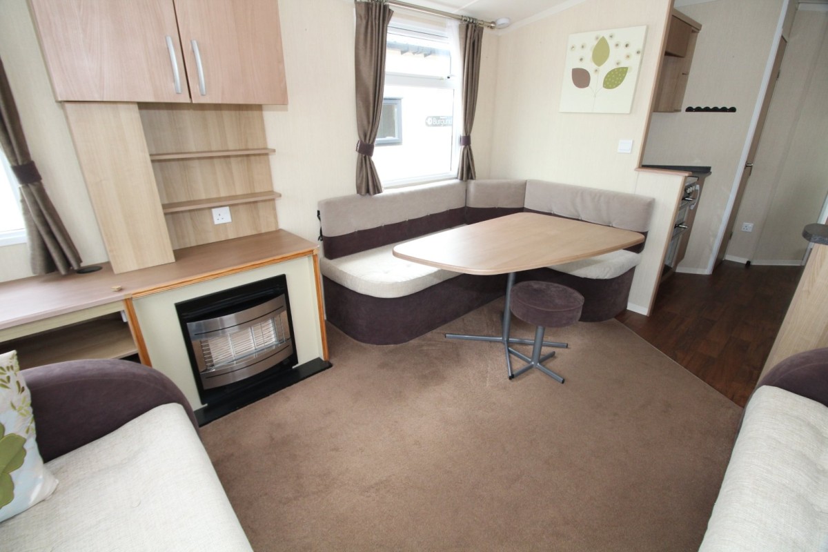 lounge with dining table in the 2013 Swift Burgundy