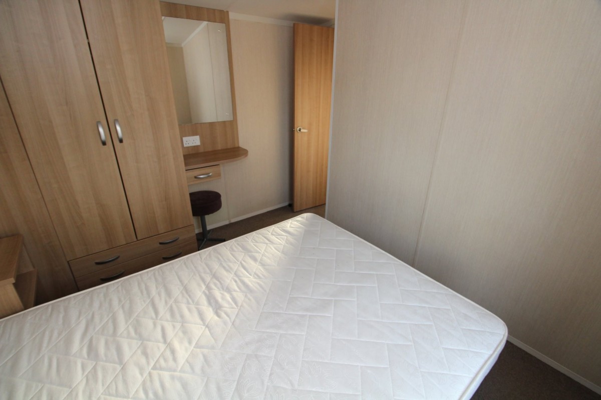 double bedroom with wardrobes in the 2013 Swift Burgundy