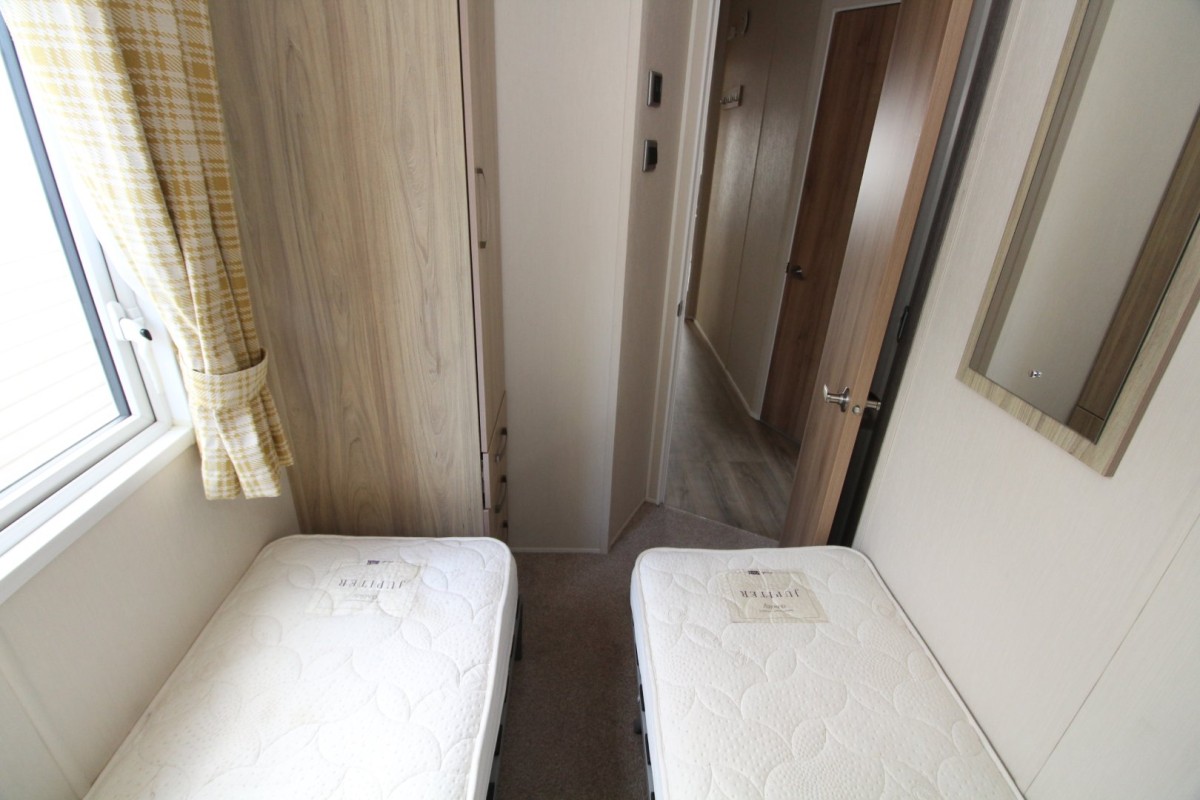 twin bedroom with wardrobes in the 2017 Willerby Rio Premier