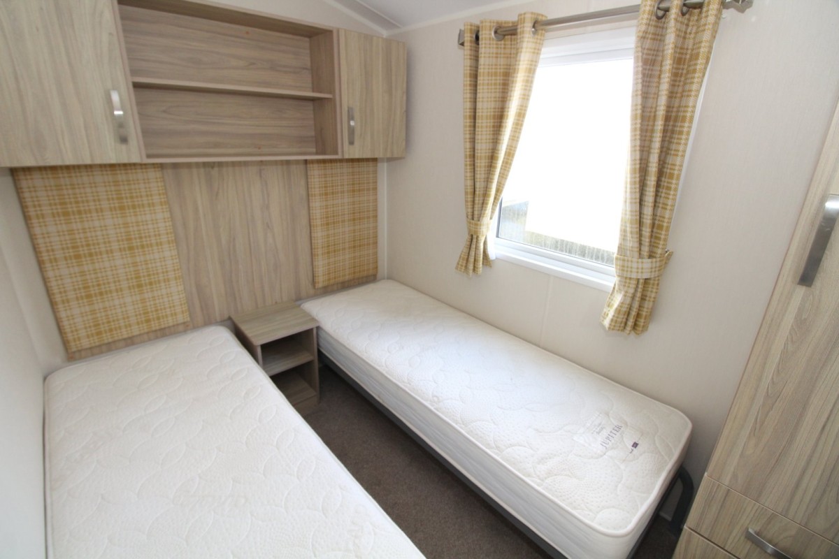second view of twin bedroom