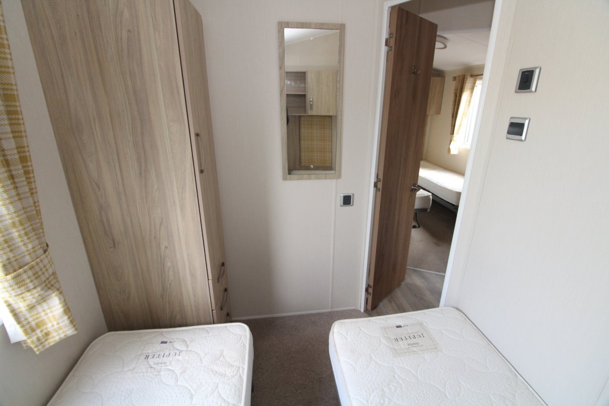 twin bedroom to door