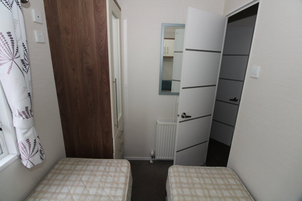twin beds withwardrobes