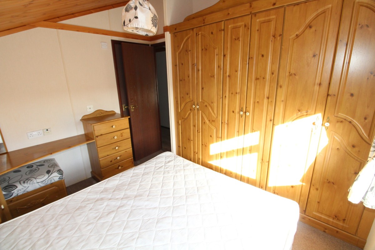 double bedroom with large wardrobes