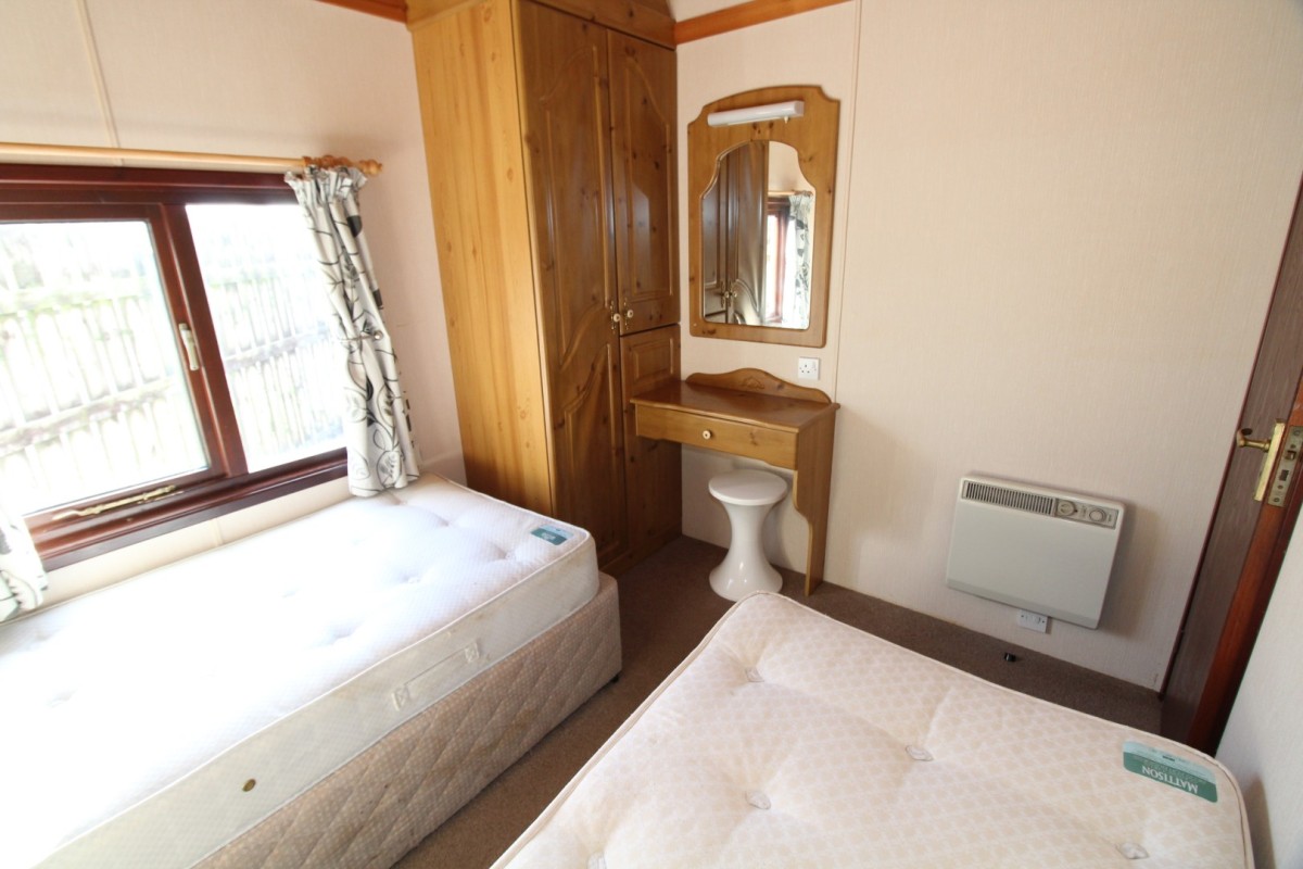 second view of twin bedroom