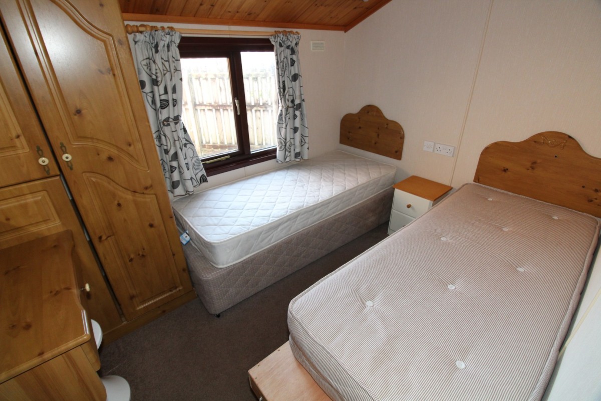 twin beds in the third bedroom in the 1999 Cosalt Cezanne lodge