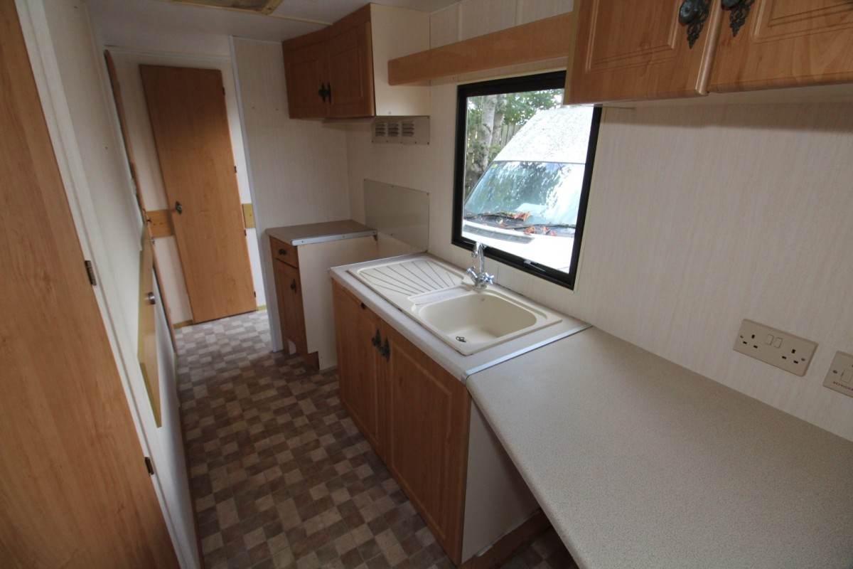 galley style kitchen in the 2000 Cosalt Torino