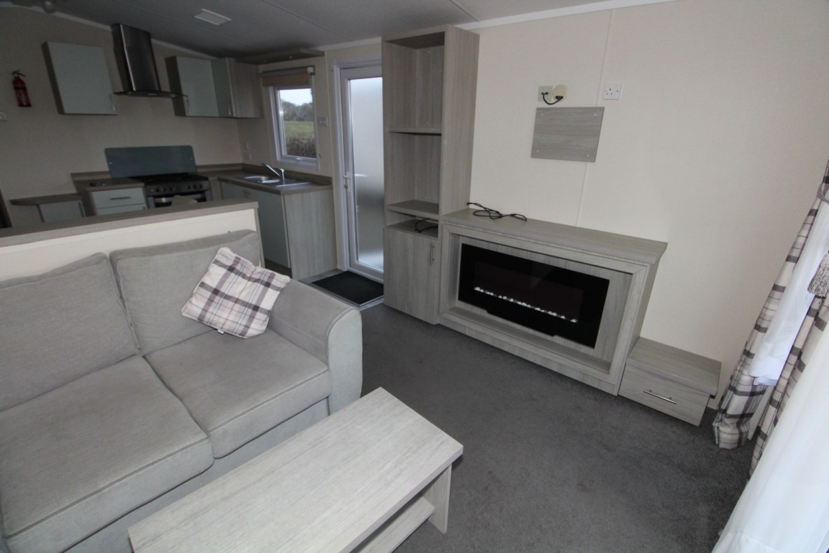 sofas and fire place in the 2017 Regal Elegance