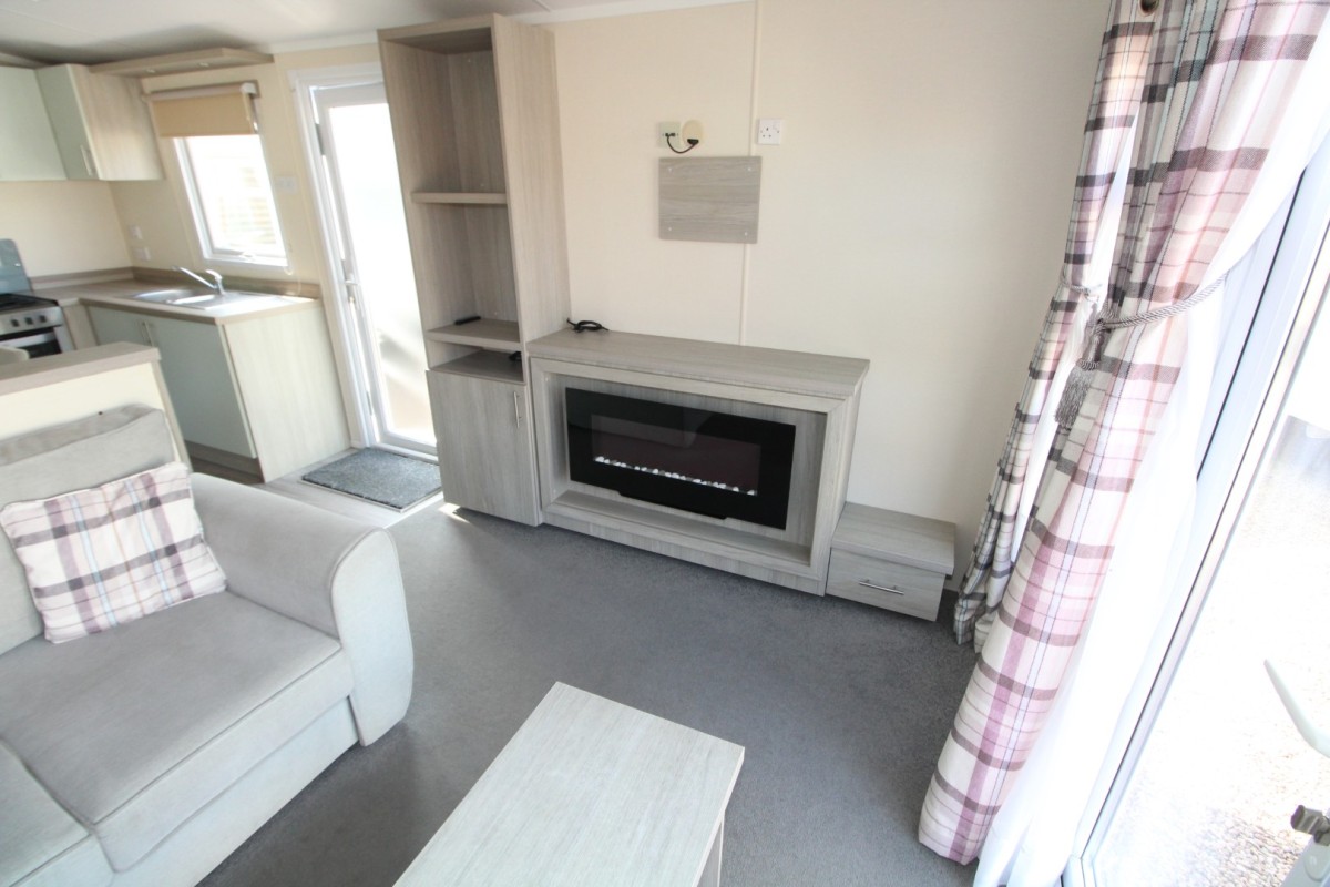 sofas and fire place in the 2017 Regal Elegance