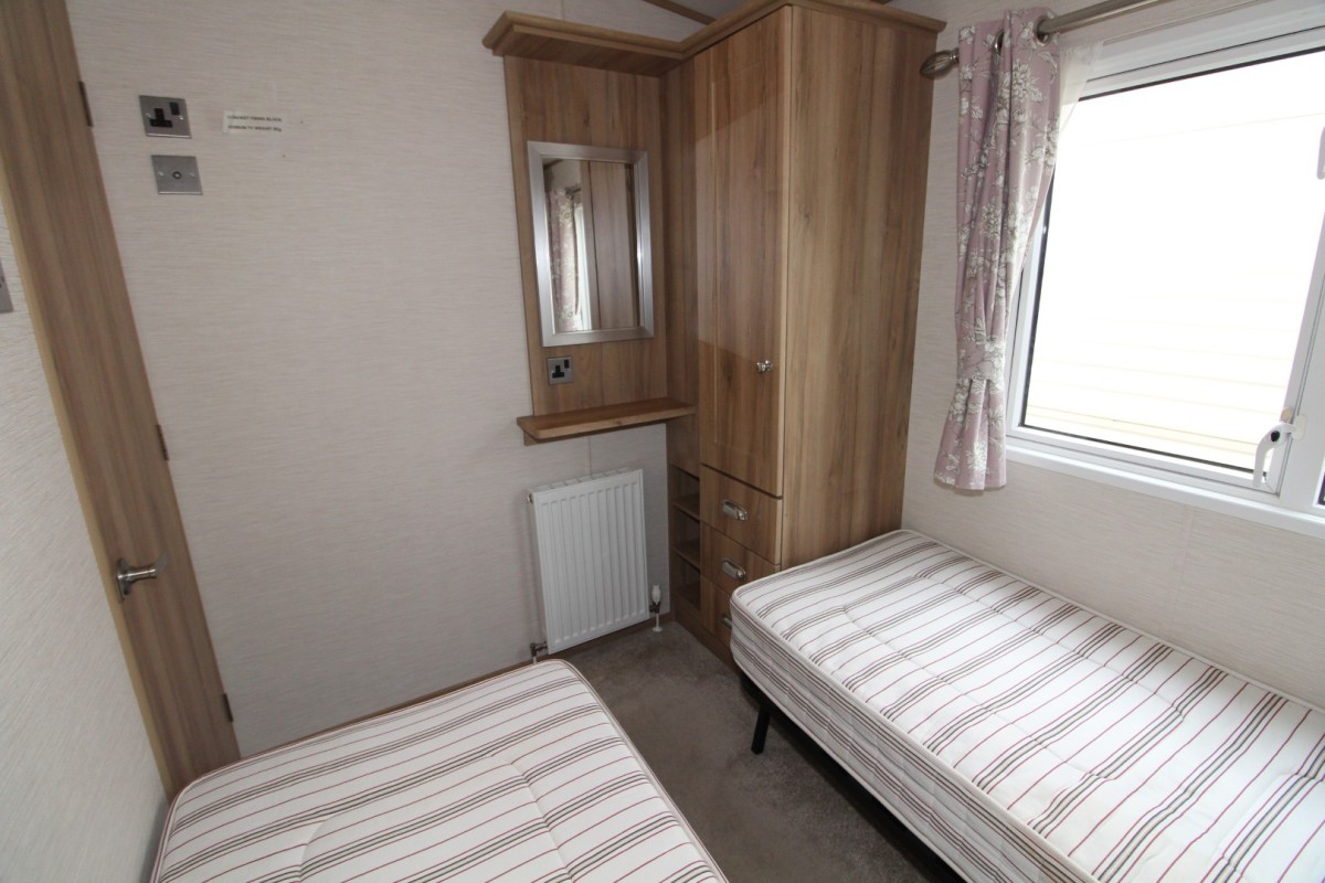 second view of twin bedroom