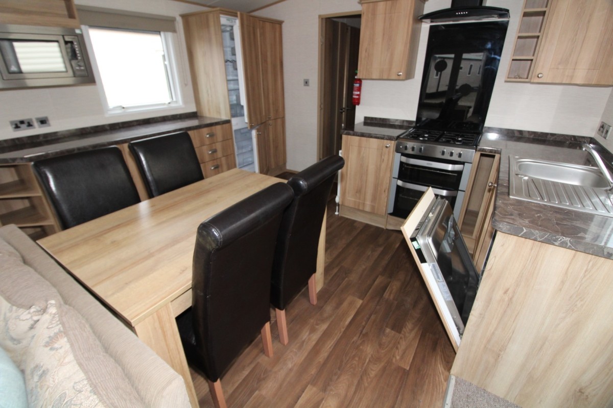 dining area to kitchen in the 2016 ABI Ambleside