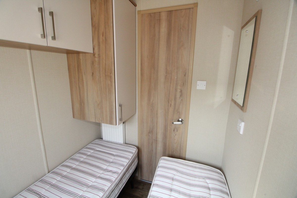 second view of twin bedroom