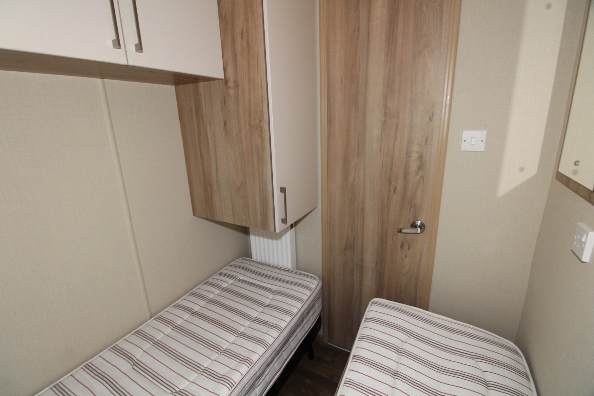 second view of twin bedroom