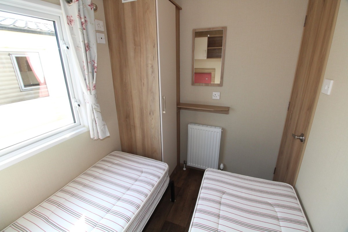 third bedroom with twin beds in the 2016 ABI Oakley