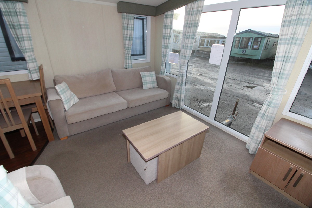 lounge with front patio doors in the 2013 Swift Bordeaux