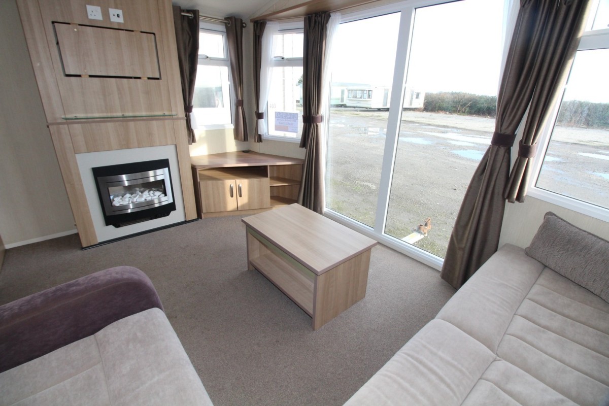 lounge with patio doors in the 2014 Swift Burgundy