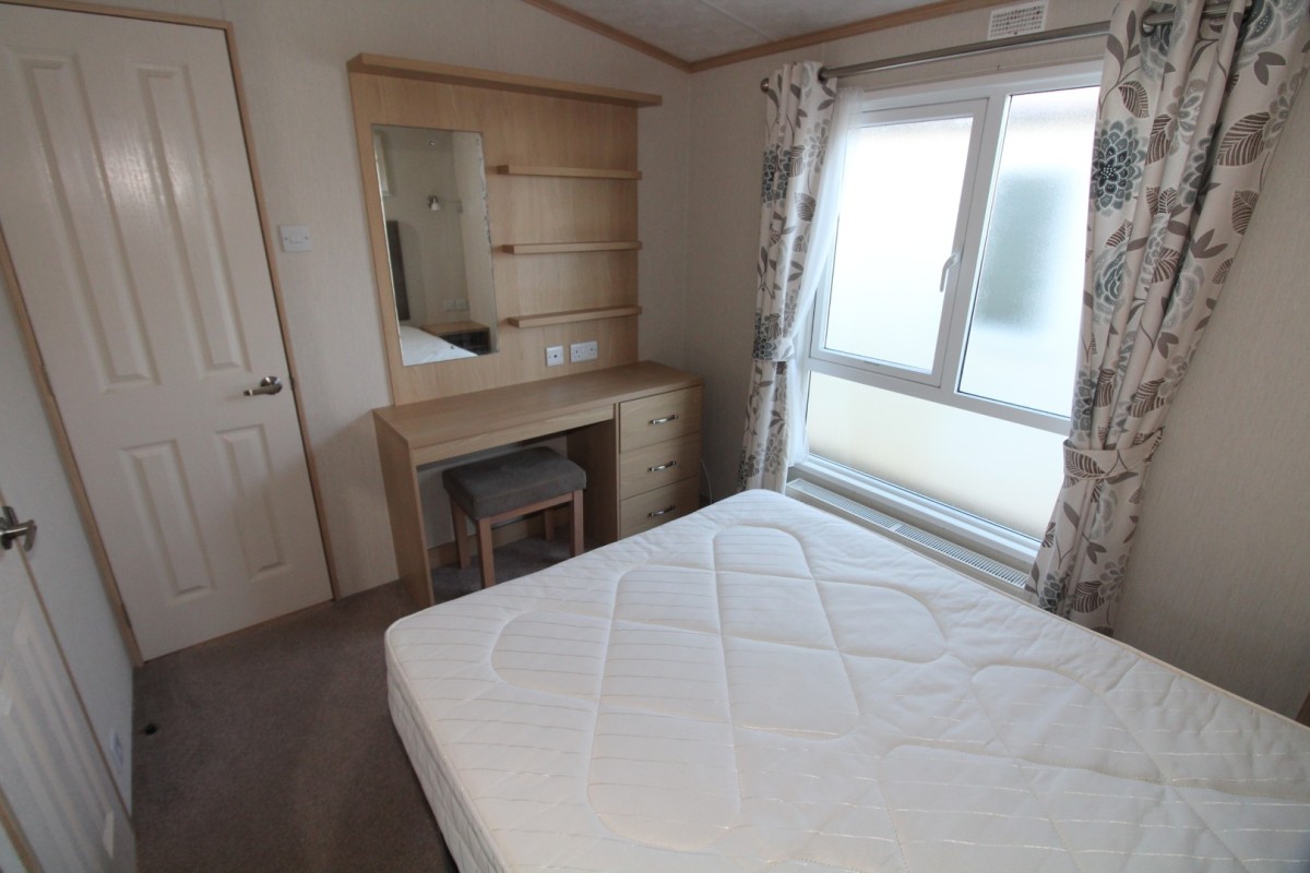 double bedroom with dressing table