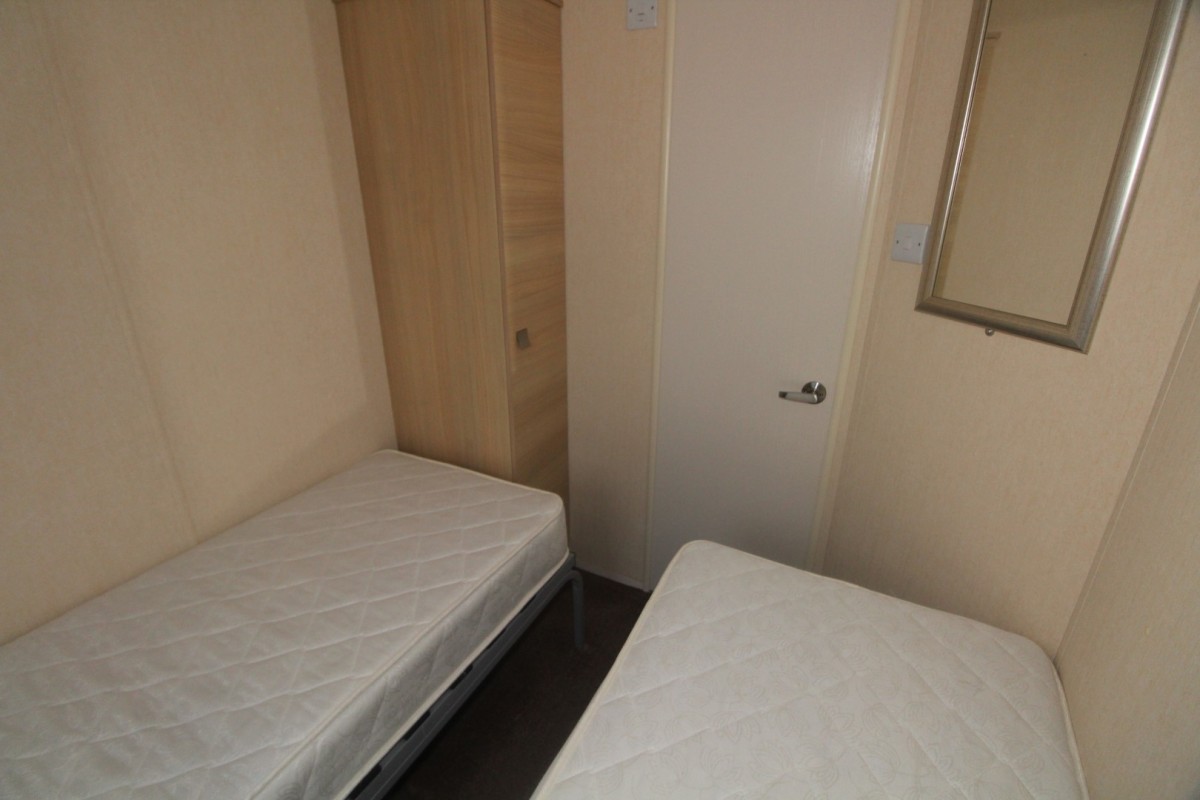 second view of twin bedroom