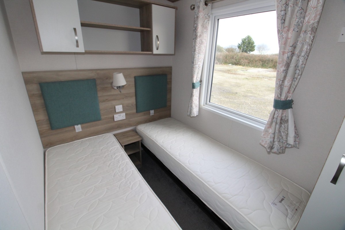 second view of twin bedroom