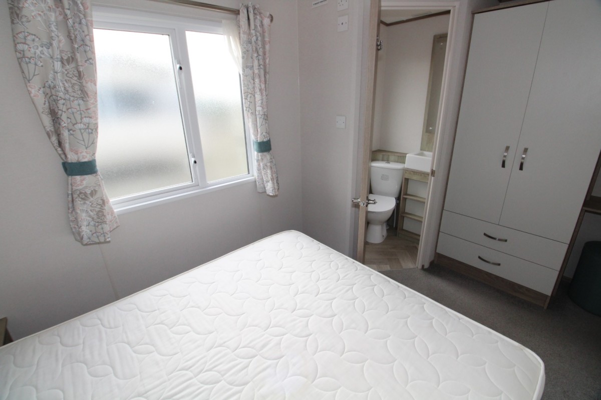 double bedroom with en-suite bathroom in the 2022 ABI Wimbledon