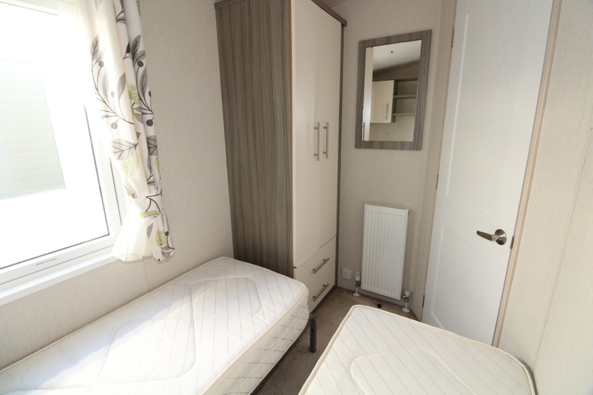 second view of twin bedroom