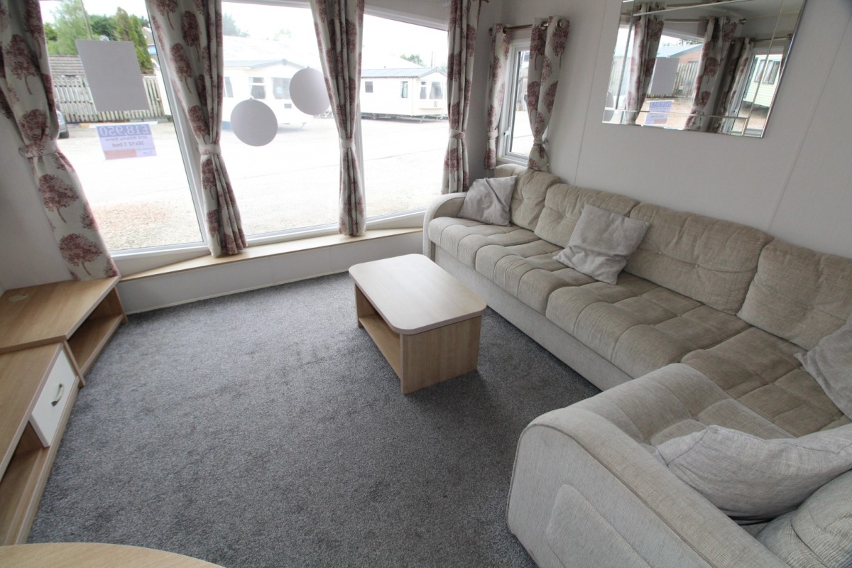 lounge with large front windows in the 2016 Willerby Sierra
