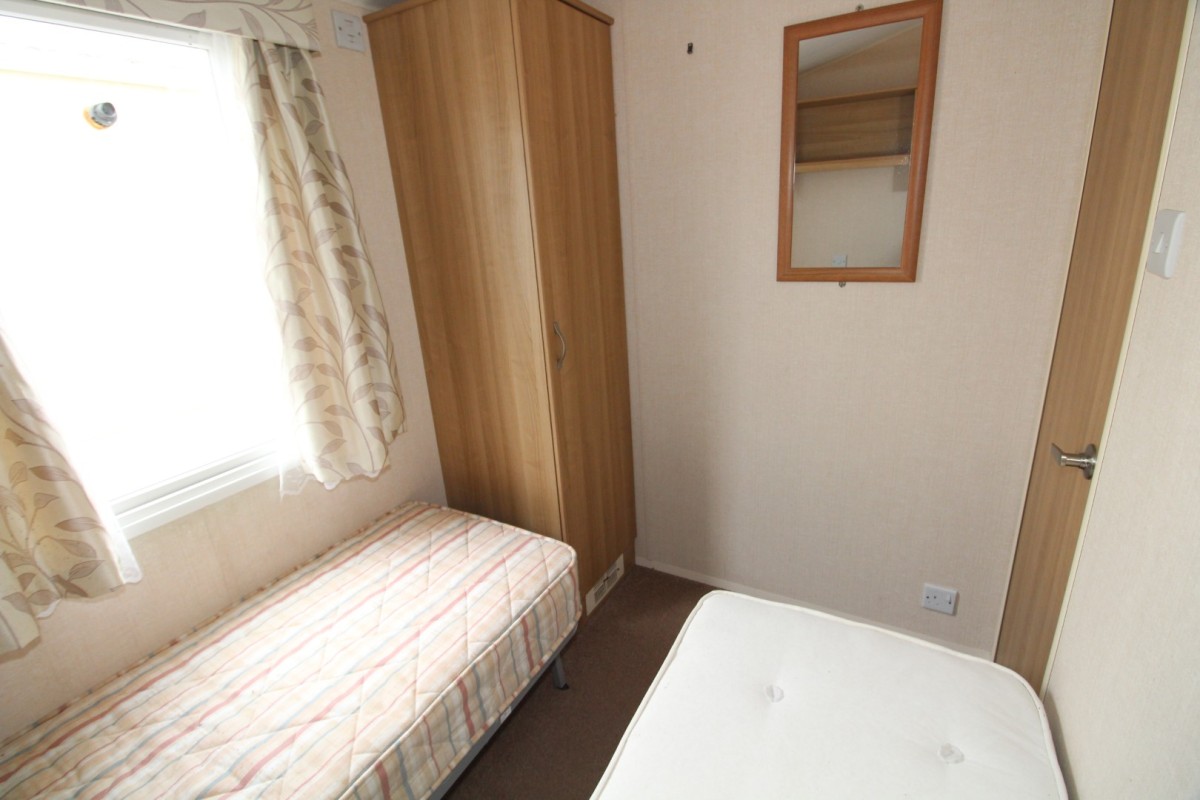second view of twin bedroom