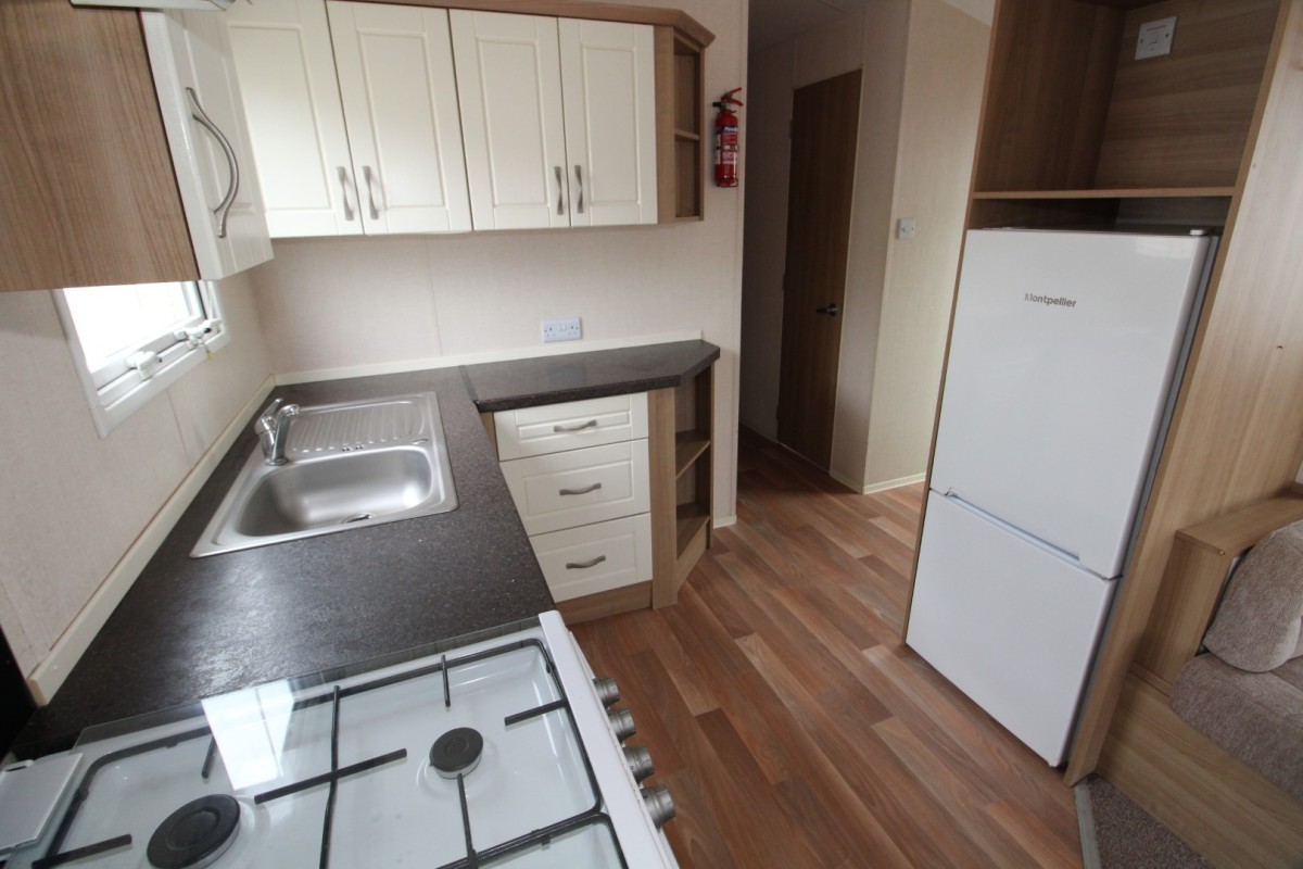 kitchen with fridge in the 2011 Atlas Chorus