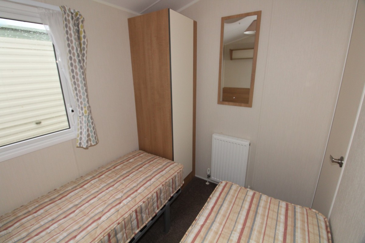 second view of twin bedroom