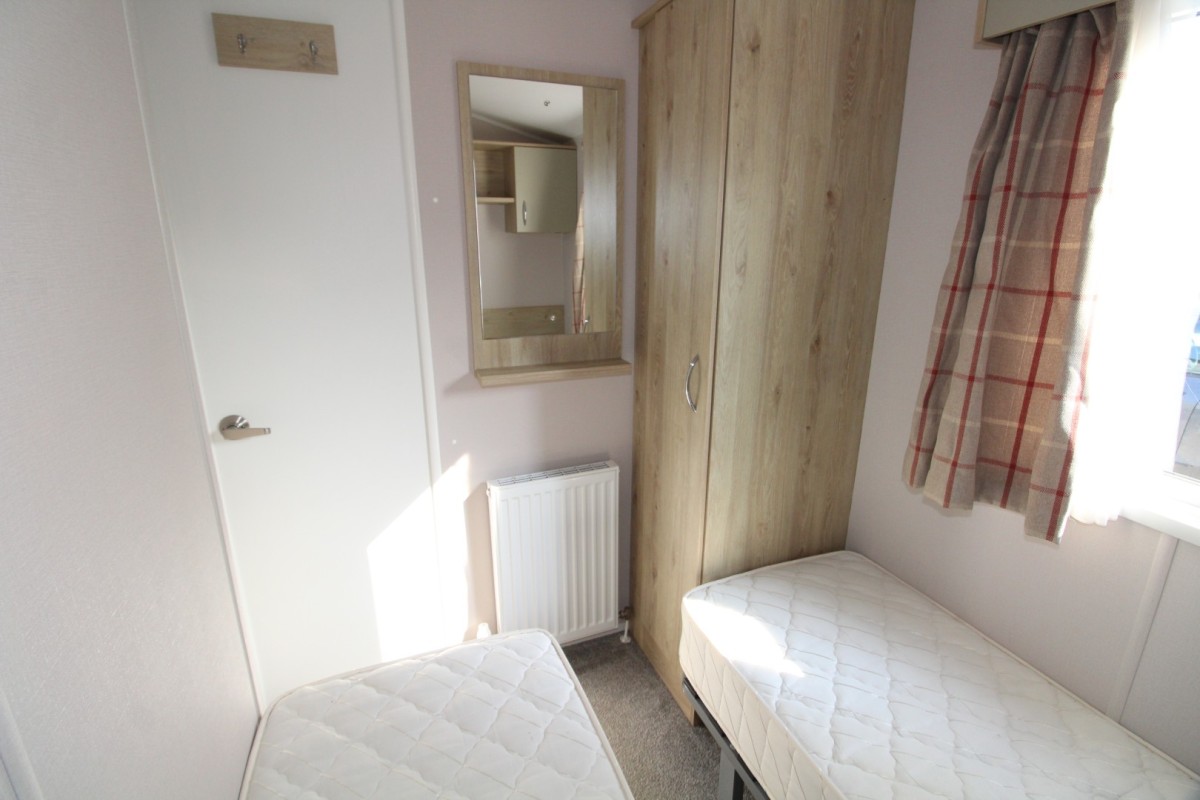 second view of twin bedroom