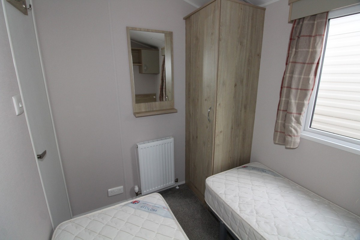 second view of twin bedroom