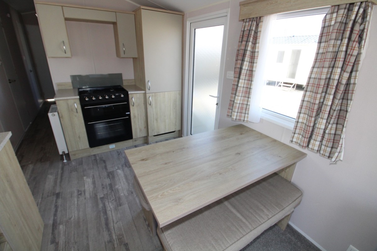 dining area to kitchen in the 2021 Atlas Mirage 