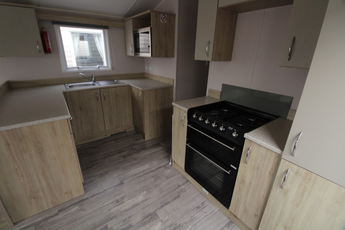 modern  kitchen with oven in the 2021 Atlas Mirage 