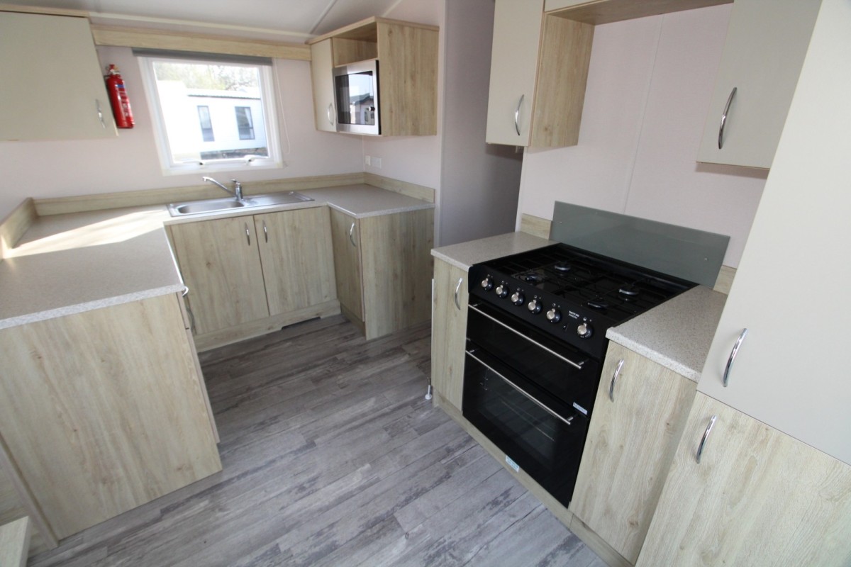 modern  kitchen with oven in the 2021 Atlas Mirage 