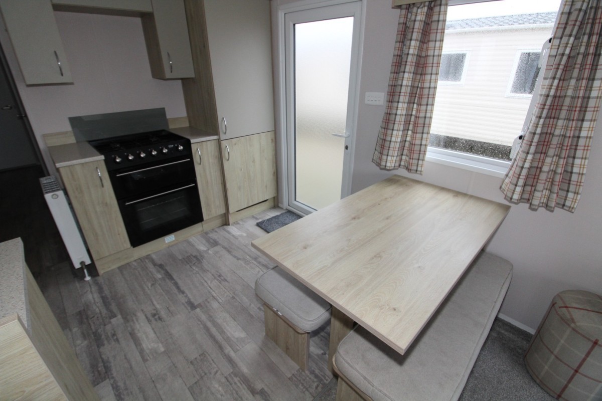 dining area to kitchen in the 2021 Atlas Mirage