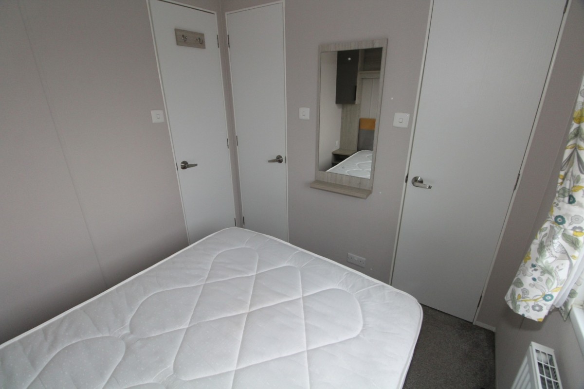 double bed with mirror