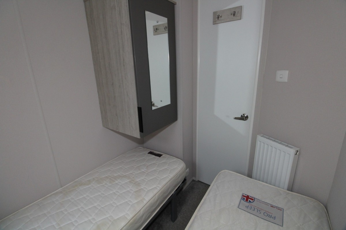 second view of twin bedroom