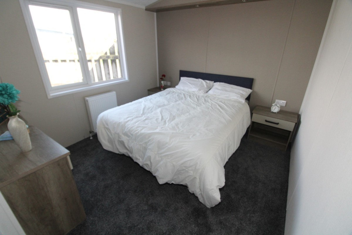 master double bedroom in the 2018 Atlas Lilac Lodge