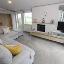 lounge to dining area in the 2023 Atlas Oakwood Lodge 
