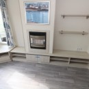 lounge with tv area and fire