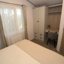 double bedroom with dressing table in the 2024 Atlas Sherwood Lodge