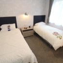 twin bedroom in the 2023 Atlas Wisteria Lodge
