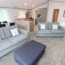 lounge to kitchen in the 2023 Atlas Wisteria Lodge