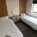 2023 Atlas Lilac Lodge twin bedroom