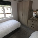 second view of twin bedroom