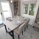 dining area in the 2023 Atlas Lilac Lodge